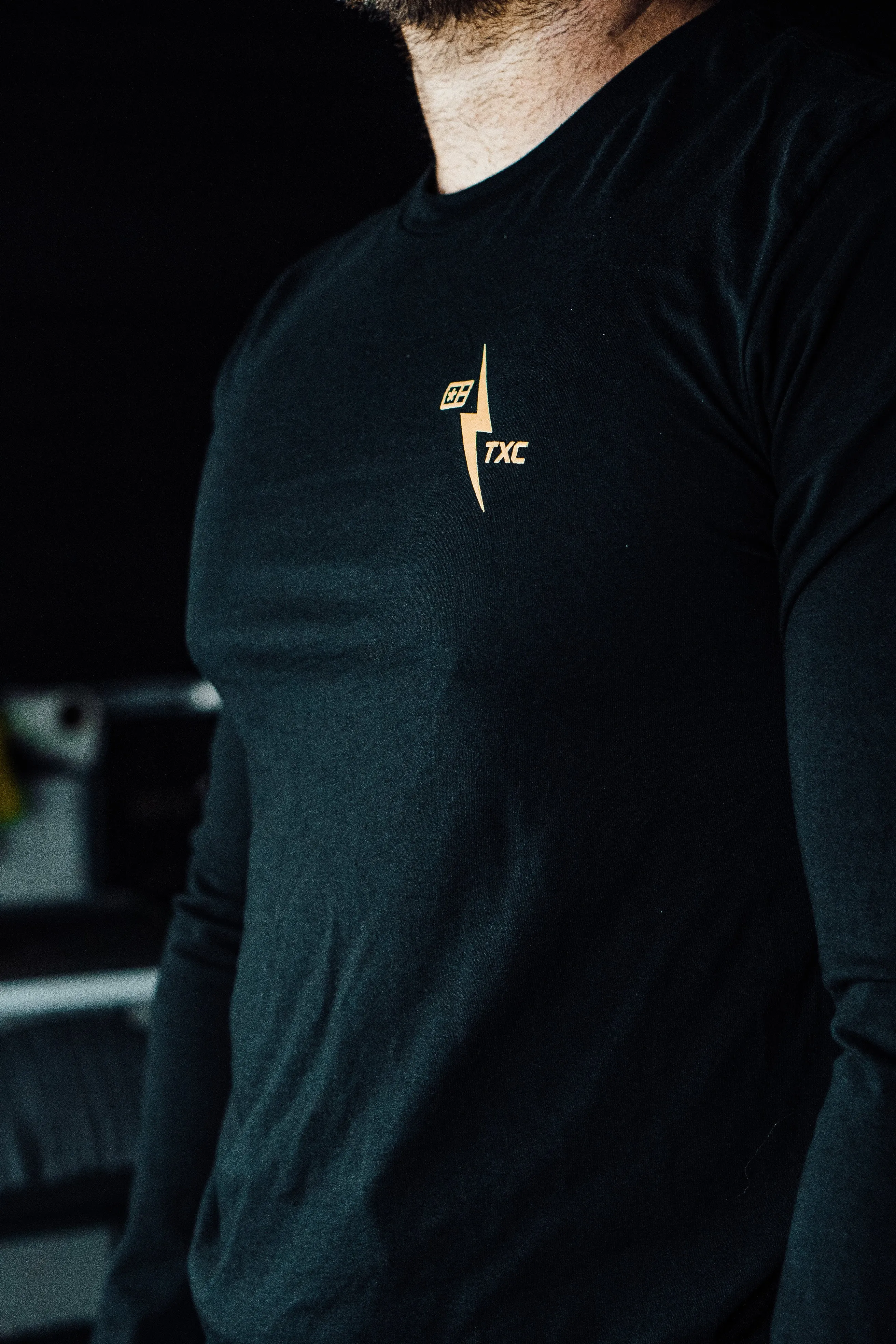 Black Long-sleeve shirt with Tan logo