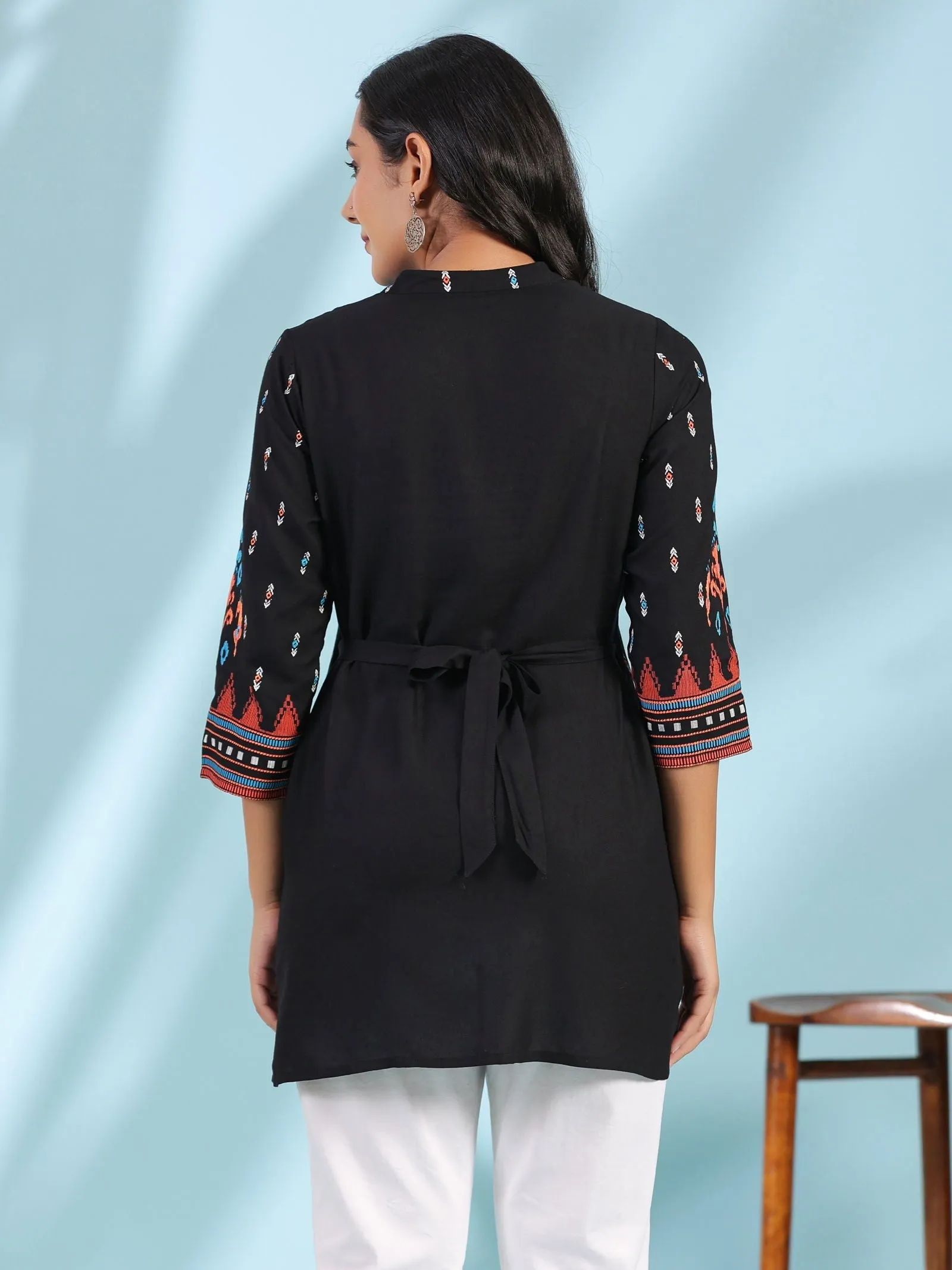 Jashvi Black Rayon Ikat Placement Printed High-Low Tunic With Side Slits & Tassels