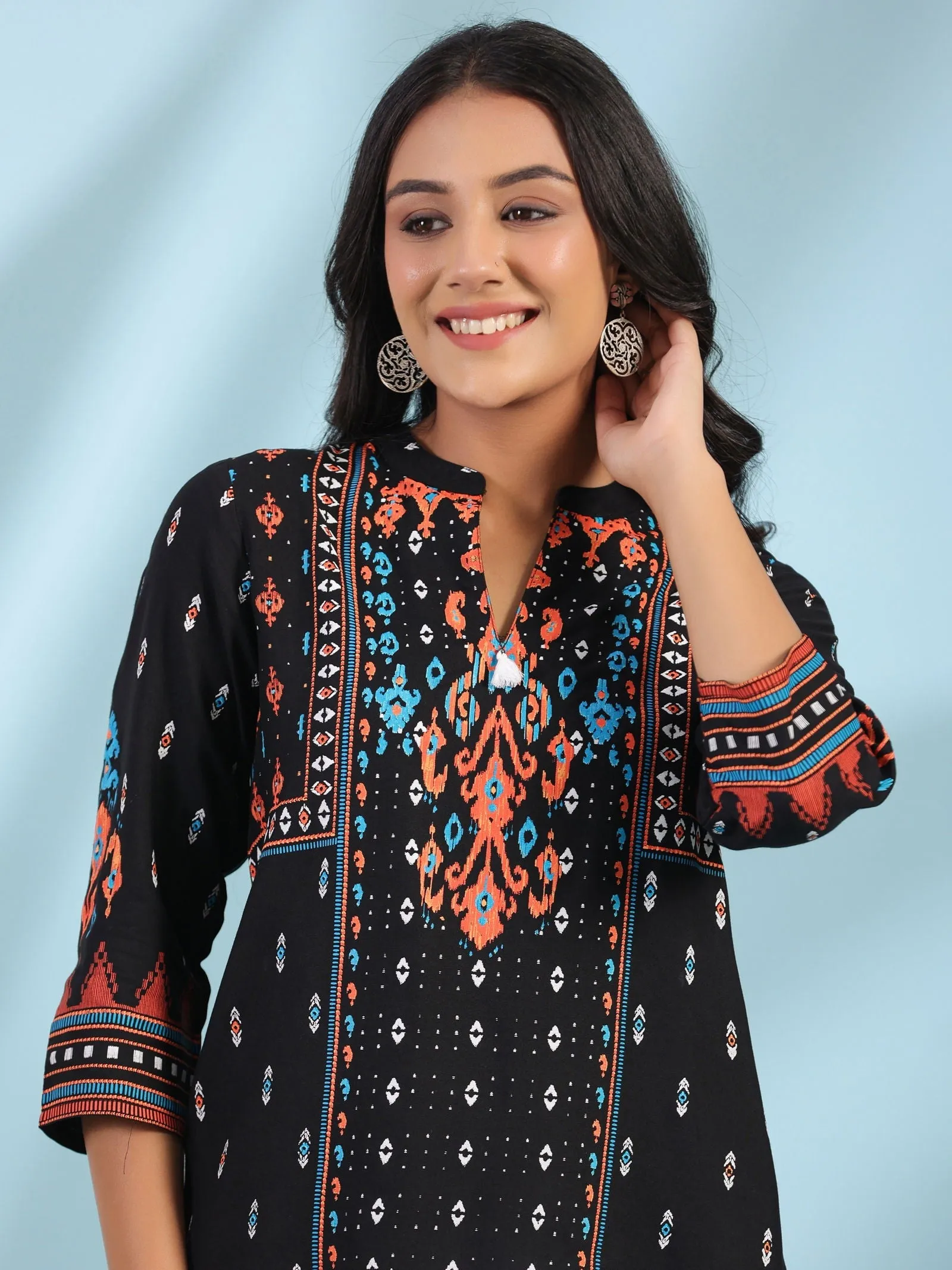 Jashvi Black Rayon Ikat Placement Printed High-Low Tunic With Side Slits & Tassels