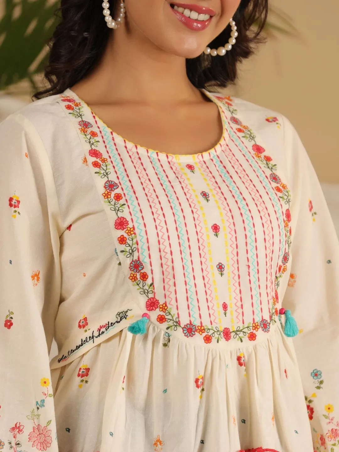 Jashvi Women Off-White Floral Printed Cotton Peplum Tunic With Thread Embroidery